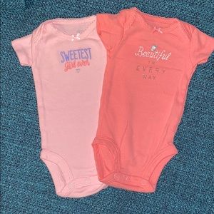 Two carters newborn onesies